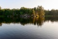 Quiet Lake among the Wild in the Morning