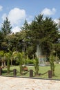 Quiet landscape, public park with water fountain in sunny day Royalty Free Stock Photo