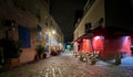 Quiet Montmartre street scene on October night. Paris, France.