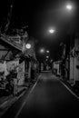 Quiet black and white street in the middle of night