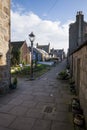 A quiet North Square walking street with old granite houses next to the sea and beach in Aberdeen city