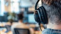 Close-up of ear with headphones in tranquil office workspace promoting soundproofing and focus solutions Generative AI Royalty Free Stock Photo