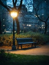 Quiet Park Scene An Illuminated Bench in a Calm and Serene Night Setting at Dark Hours Royalty Free Stock Photo