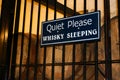 Quiet Please Whiskey Sleeping Sign with Barrels of Whiskey