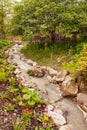 Rivulet leaving pond