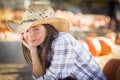 Quiet Preteen Girl Portrait at the Pumpkin Patch