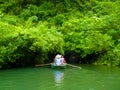 Quiet Ride On Peaceful Tam Coc River Royalty Free Stock Photo