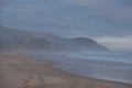 Quiet sandy beach at Brenton on Sea, Knysna, photographed at sundown, South Africa. Royalty Free Stock Photo