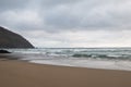 Quiet, sandy beach at Coumeenoole on Dingle Peninsula Royalty Free Stock Photo