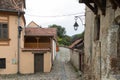 Quiet street in the castle of old city. Sighisoara city in Romania Royalty Free Stock Photo