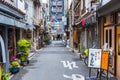 Quiet street nobody alley in Japan with izakaya Bar SME business shop closed. Osaka, Japan - January 18, 2019
