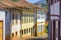 Quiet street with old colorful houses in colonial architecture Royalty Free Stock Photo