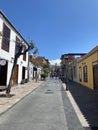 The quiet streets of the island\'s capital Santa Cruz de la Palma. Vintage balconies, beautiful houses, paving stones Royalty Free Stock Photo