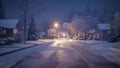 A quiet suburban street on a cold winter night. The houses and driveways are covered in snow but the road itself is