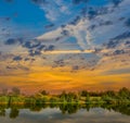 Quiet summer river at the dramatic sunset Royalty Free Stock Photo