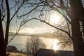 Quiet sunrise over lake and rural landscape on a cold and peaceful early autumn morning in the countryside with Royalty Free Stock Photo