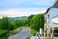 Quiet tree lined rural road in a spring landscape Royalty Free Stock Photo