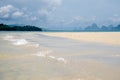 The quiet waves go in coral sands beach at Phang Nga Bay