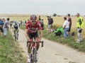 Tim Wellens Riding on a Cobblestone Road - Tour de France 2015