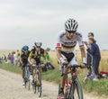 Emanuel Buchmann Riding on a Cobblestone Road - Tour de France 2