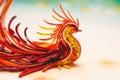 Quilled very beautiful phoenix with beautiful colors in paper strips 3D photography