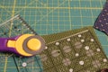 Quilt rotary cutting mat with fabric in background