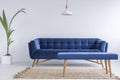 Quilted blue sofa and bench Royalty Free Stock Photo