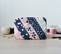 Quilted patchwork notion pouch, thread and buttons Royalty Free Stock Photo