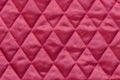 Quilted red satin fabric