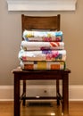 Quilts Stacked on Wooden Chair Royalty Free Stock Photo