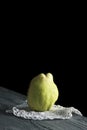 Quince fruit on a wooden table