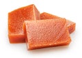 Quince paste cubes or quince marmalade cubes on white background. File contains clipping paths Royalty Free Stock Photo