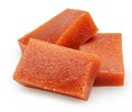 Quince paste cubes or quince marmalade cubes on white background. File contains clipping paths Royalty Free Stock Photo