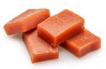Quince paste cubes or quince marmalade cubes on white background. File contains clipping paths Royalty Free Stock Photo