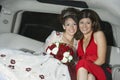 Quinceanera Sitting With Mother In Limousine Royalty Free Stock Photo