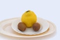 The quinces and two Kiwis Royalty Free Stock Photo