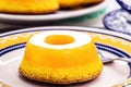 quindim or Brisa do Lis, typical sweet from Brazil and Portugal, made with egg yolks, almonds or grated coconut Royalty Free Stock Photo