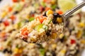 Quinoa black bean salad with corn, red green pepper, onion. Healthy food.