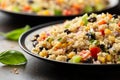 Quinoa black bean salad with corn, red green pepper, onion. Healthy food.