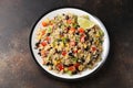 Quinoa black bean salad with corn, red green pepper, onion. Healthy food.