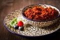 Quinoa blueberries and raspberries on a plate with black backgro Royalty Free Stock Photo