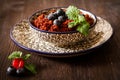 Quinoa blueberries and raspberries on a plate with black backgro Royalty Free Stock Photo