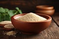 Quinoa in bowl on wooden kitchen table Royalty Free Stock Photo