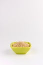 Quinoa in ceramic cup isolated on white background Royalty Free Stock Photo