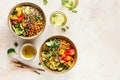 Quinoa, chickpeas and vegetables bowls. Royalty Free Stock Photo