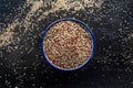 Quinoa mix. Mixed white, red and black quinoa seeds in a bowl Royalty Free Stock Photo