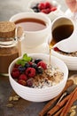 Quinoa porridge with raspberry and blueberry Royalty Free Stock Photo