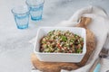 Quinoa Quinua salad with tomatoes and herbs in white bowl Royalty Free Stock Photo