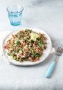 Quinoa Quinua salad with tomatoes and herbs in white bowl Royalty Free Stock Photo