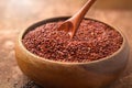 Quinoa. Red, black and white quinoa grains in a wooden bowl. Chenopodium quinoa Royalty Free Stock Photo
